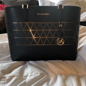 Michael Kors Black and Gold Jetsetter Purse